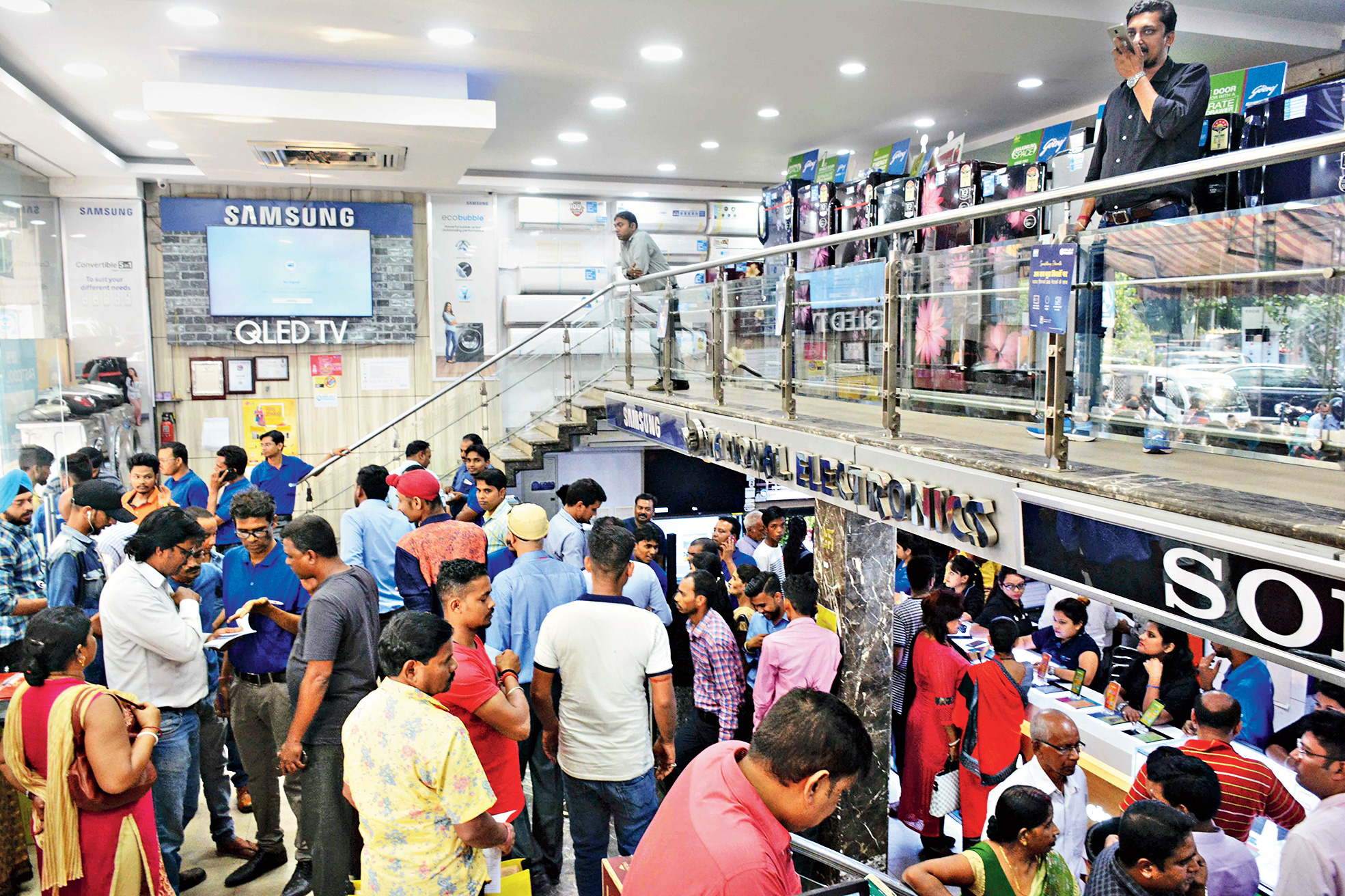 Buyers throng an electronics showroom in Bistupur, Jamshedpur.