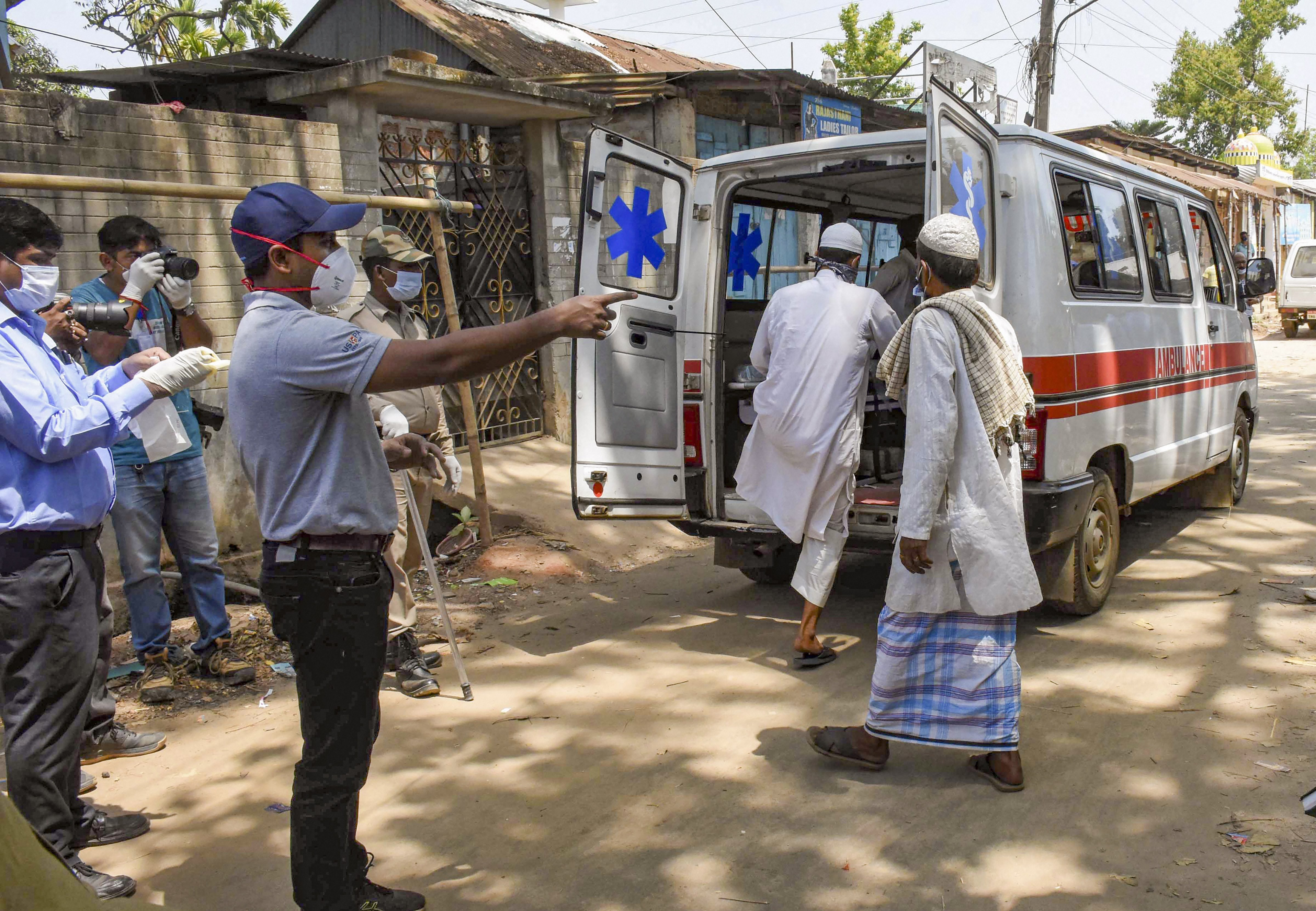 An ambulance carries devotees, who had recently attended the religious congregation at Tabligh-e-Jamaats Markaz in Delhi's Nizamuddin area, for Covid-19 tests, in Agartala, Wednesday, April 1, 2020
