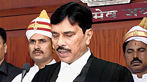 Justice Akshaya Kumar Mishra being sworn in Orissa High Court on Monday.