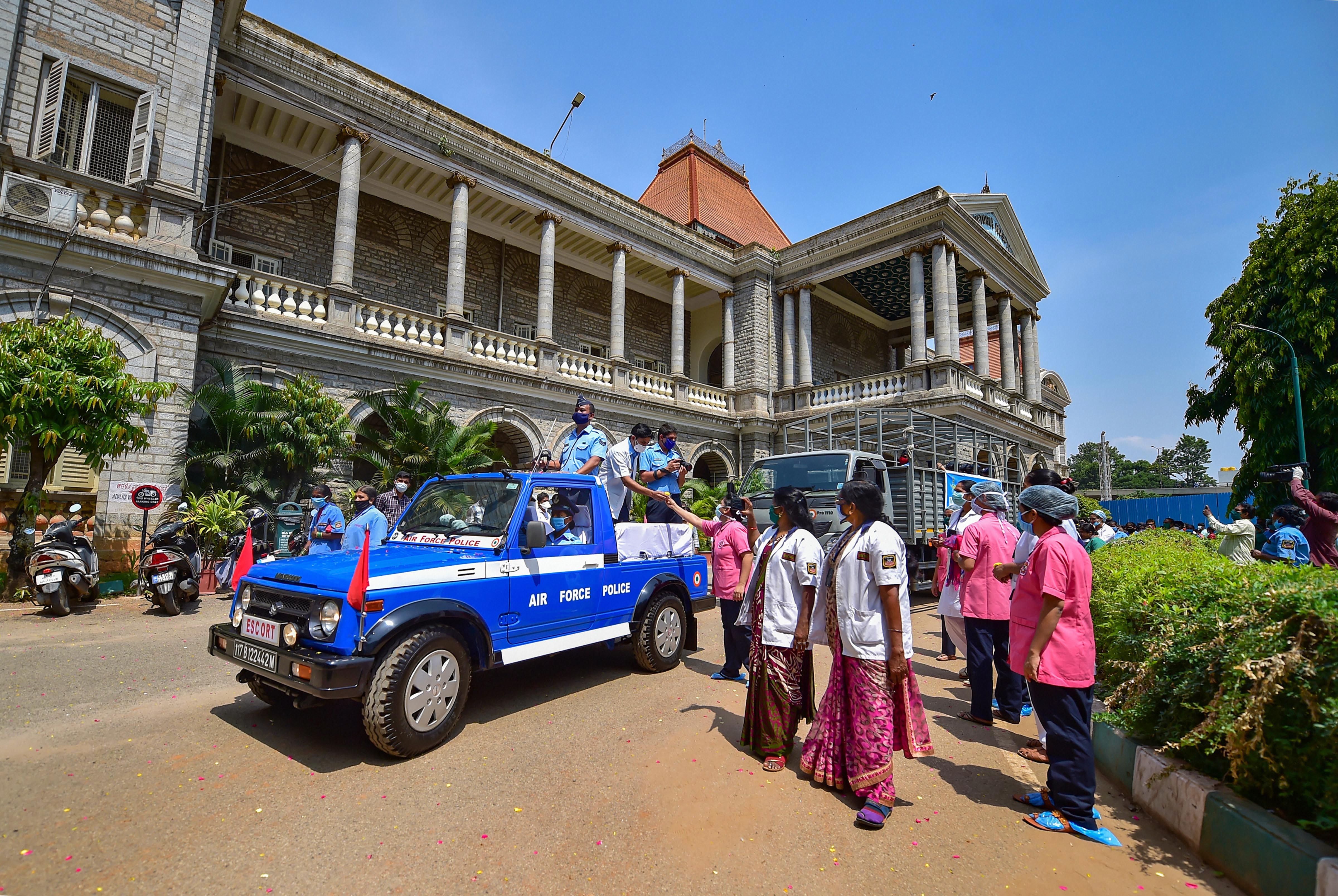 An Indian Air Force (IAF) band performs in front of medics to applaud them for their services, during the nationwide lockdown in the wake of coronavirus pandemic, in Bengaluru, Sunday, May 03, 2020