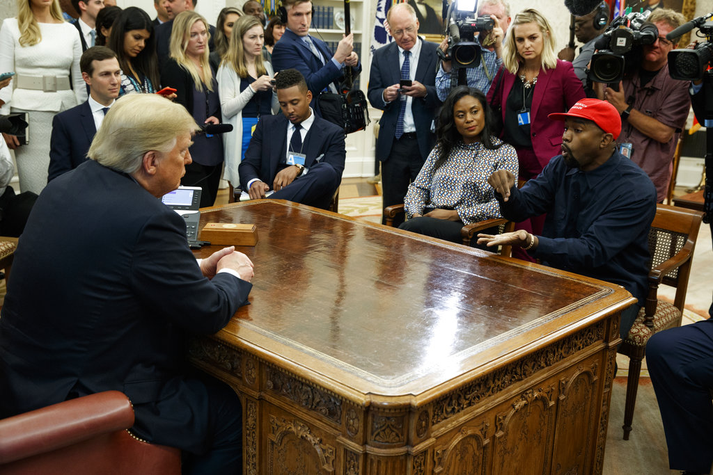 Donald Trump bonds with Kanye West.