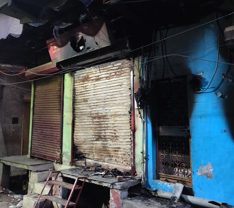 Burnt homes and shops in a Muslim mohalla in Shiv Vihar