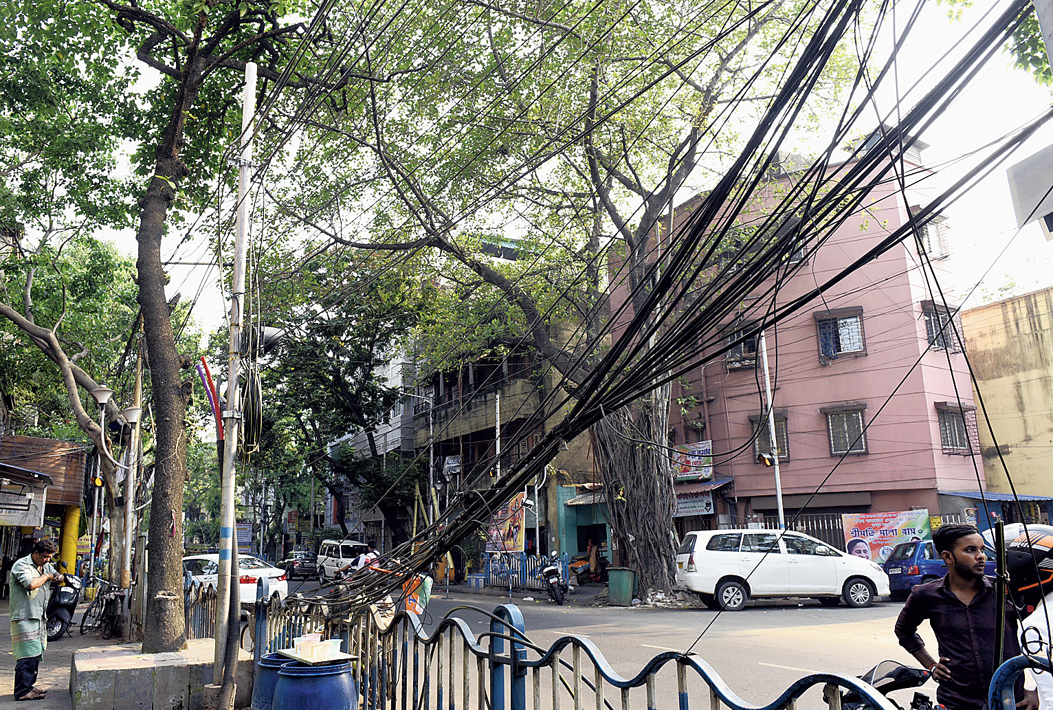A mesh of overhead wires along Harish Mukherjee Road