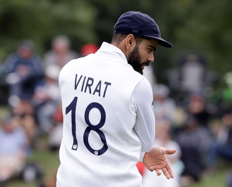 Virat Kohli gestures during play on day three of the second cricket test between New Zealand and India in Christchurch on Monday