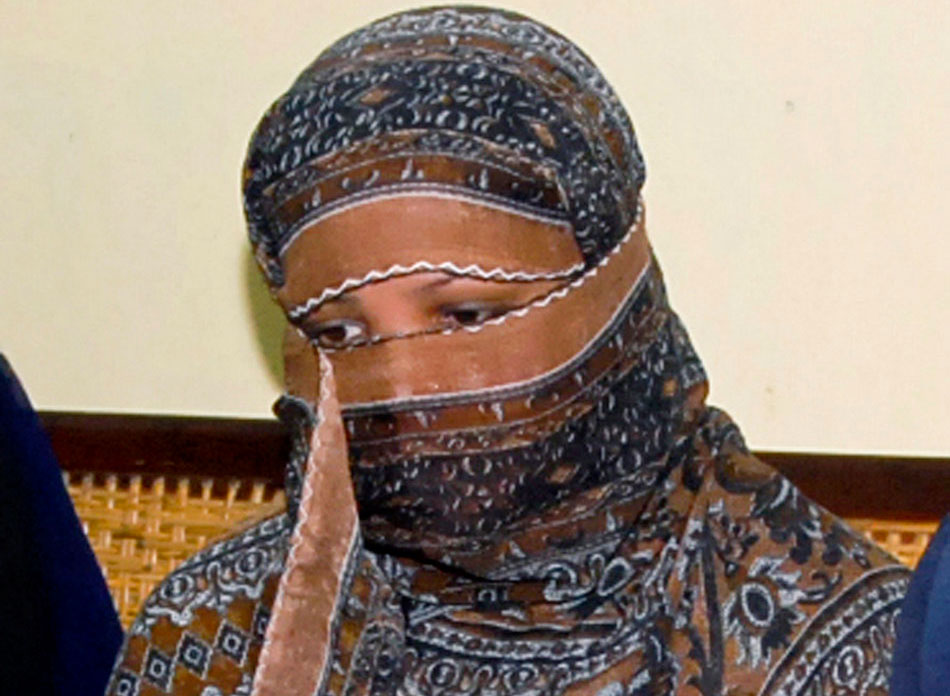 Asia Bibi listens to officials at a prison in Sheikhupura near Lahore, Pakistan on November 20, 2010.