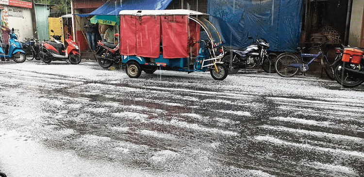 A Siliguri street covered in hailstones