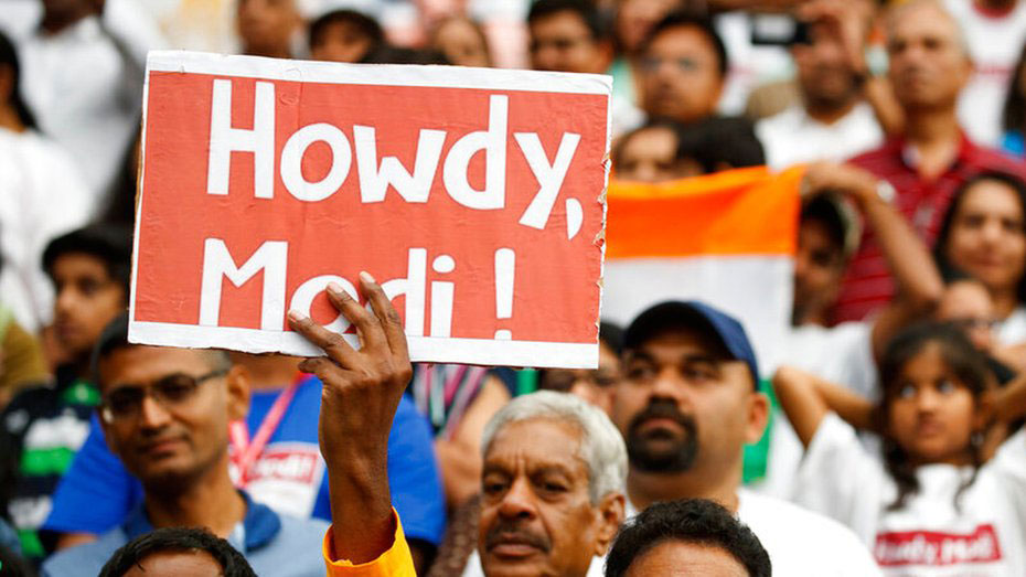 People look on as President Donald Trump arrives to speak at the 'Howdy Modi: Shared Dreams, Bright Futures' event with Prime Minister Narendra Modi at NRG Stadium on Sunday in Houston.
