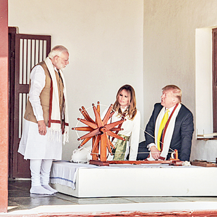 Prime Minister Narendra Modi, US President Donald Trump and First Lady Melania Trump at Sabarmati Ashram in Ahmedabad