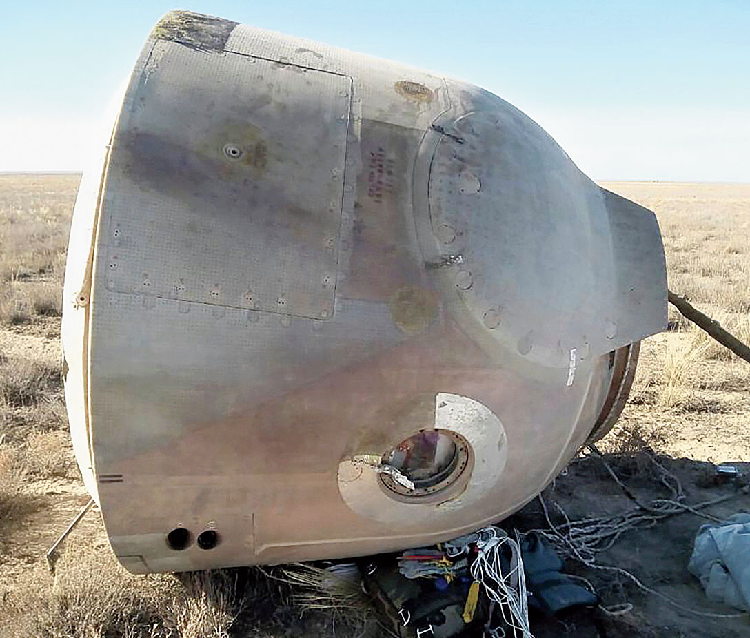 The Soyuz capsule that brought back US astronaut Nick Hague and Russian cosmonaut Alexei Ovchinin lies in a field near  Zhezkazgan, Kazakhstan. 
