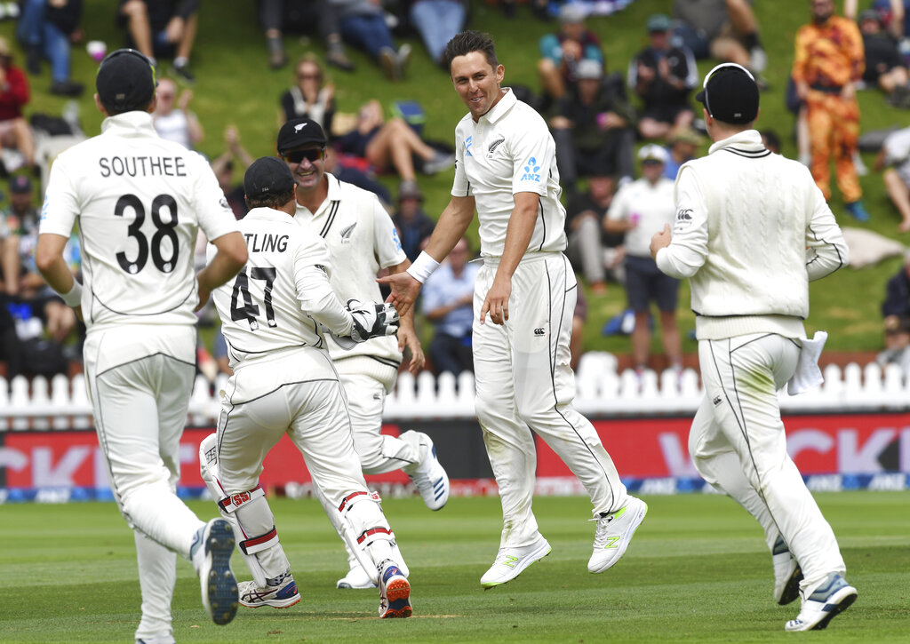 New Zealand's Trent Boult, second from right, celebrates the dismissal of Mayank Agarwal for 34 during the first Test between India and New Zealand at the Basin Reserve in Wellington, New Zealand, Friday, February 21, 2020
