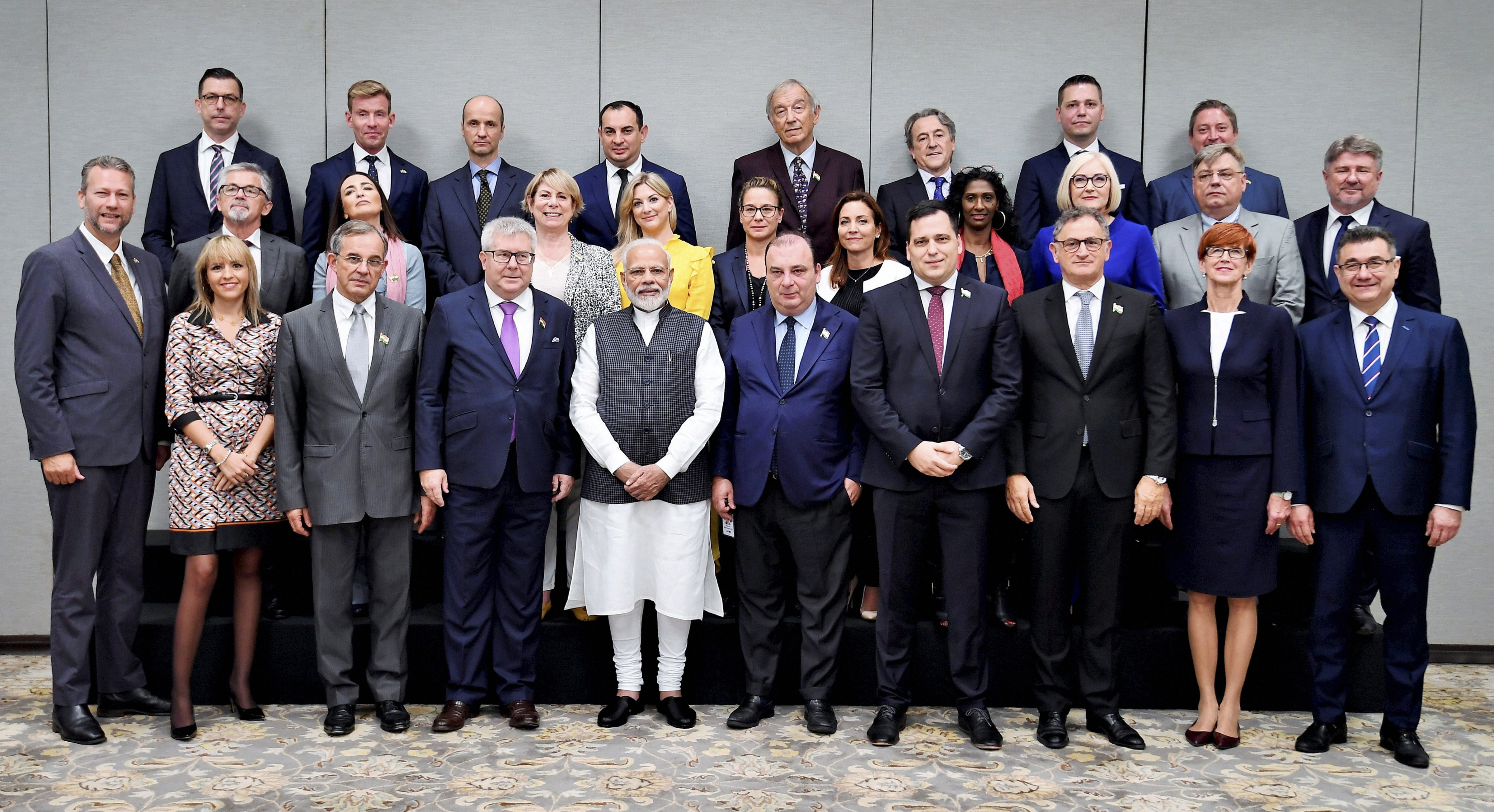 Prime Minister Narendra Modi poses for a photograph with the members of European Parliament during a call on, in New Delhi, Monday, October 28, 2019. 