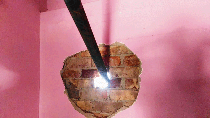 The hole the pipe created on the wall