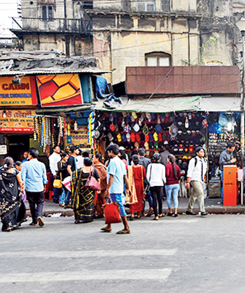 Pedestrians violating traffic rules at S.N. Banerjee Road in Calcutta.