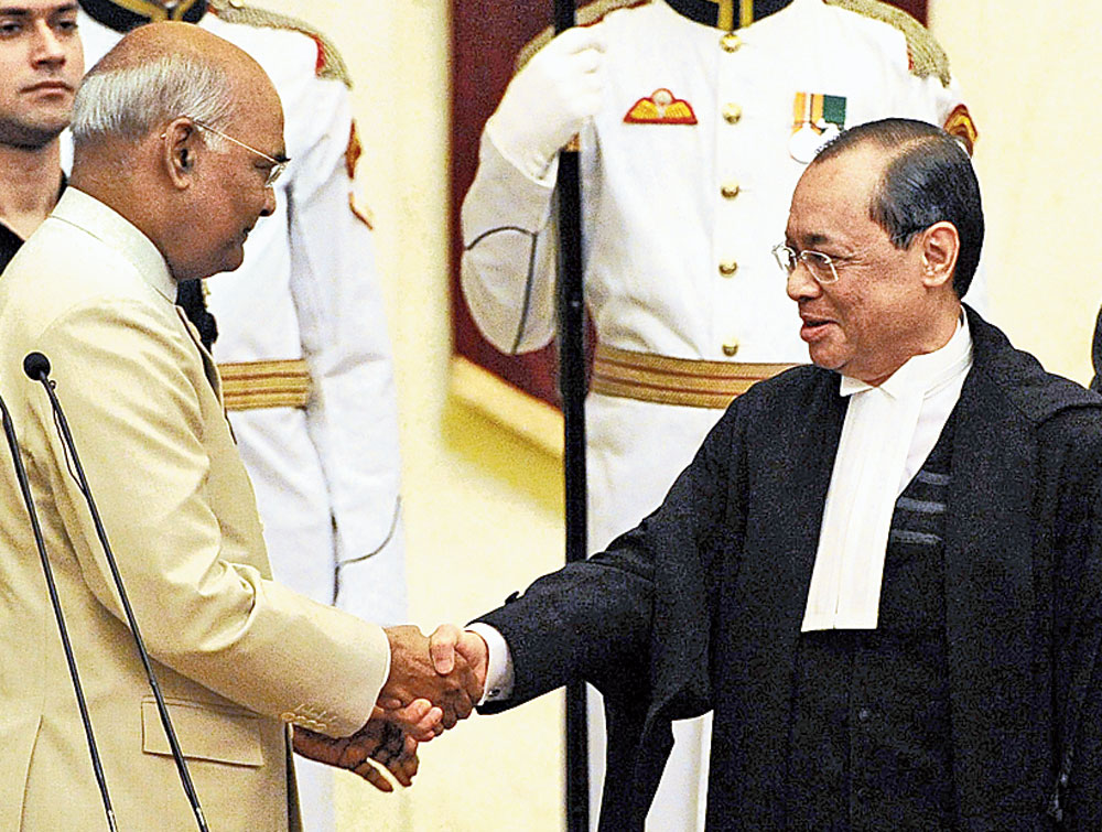 Justice Ranjan Gogoi with President Ram Nath Kovind at Rashtrapati Bhavan after being sworn in as the CJI