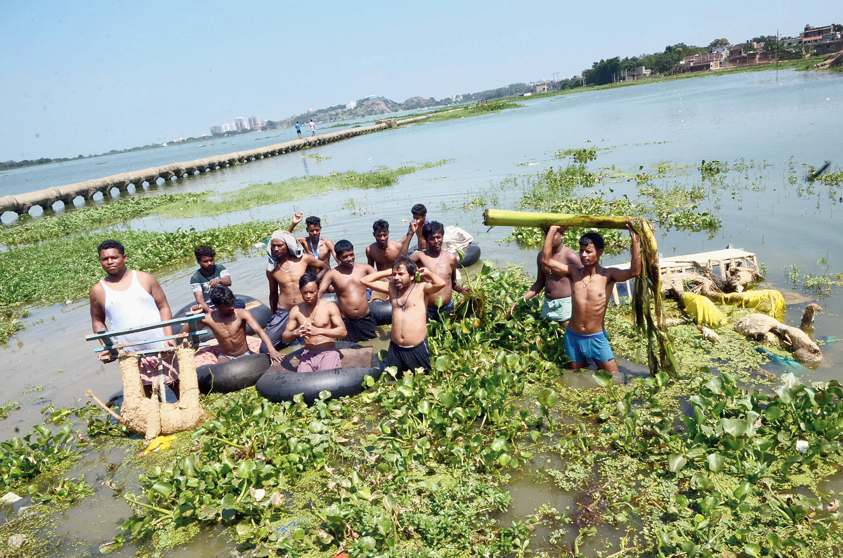Damning damage: Protesters perform jal satyagraha at Kanke Dam in Ranchi on Saturday, hoping to draw the attention of the government to the reservoir’s plight. 