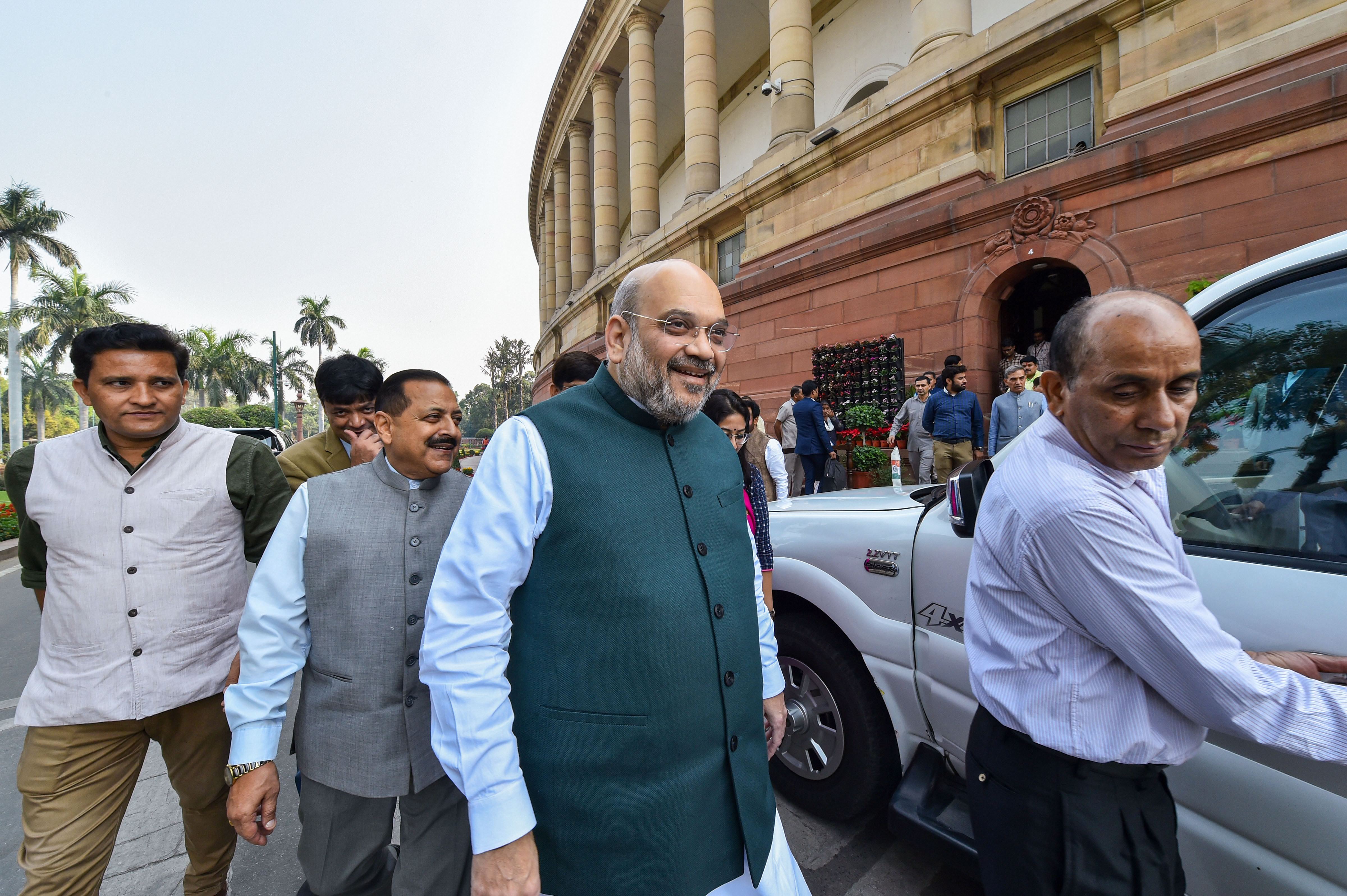  Union home minister Amit Shah leaves Parliament during the ongoing winter session, in New Delhi, Wednesday, November 20, 2019.