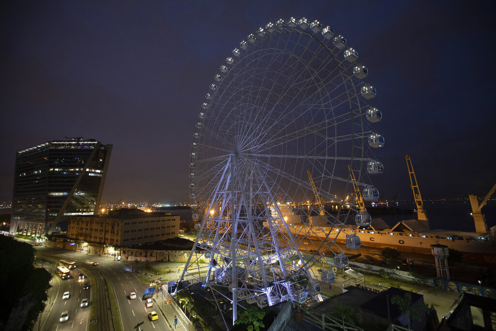 The "Rio Star" ferris wheel stands at dusk after its inauguration in Rio de Janeiro, Brazil, Friday, December 6, 2019.