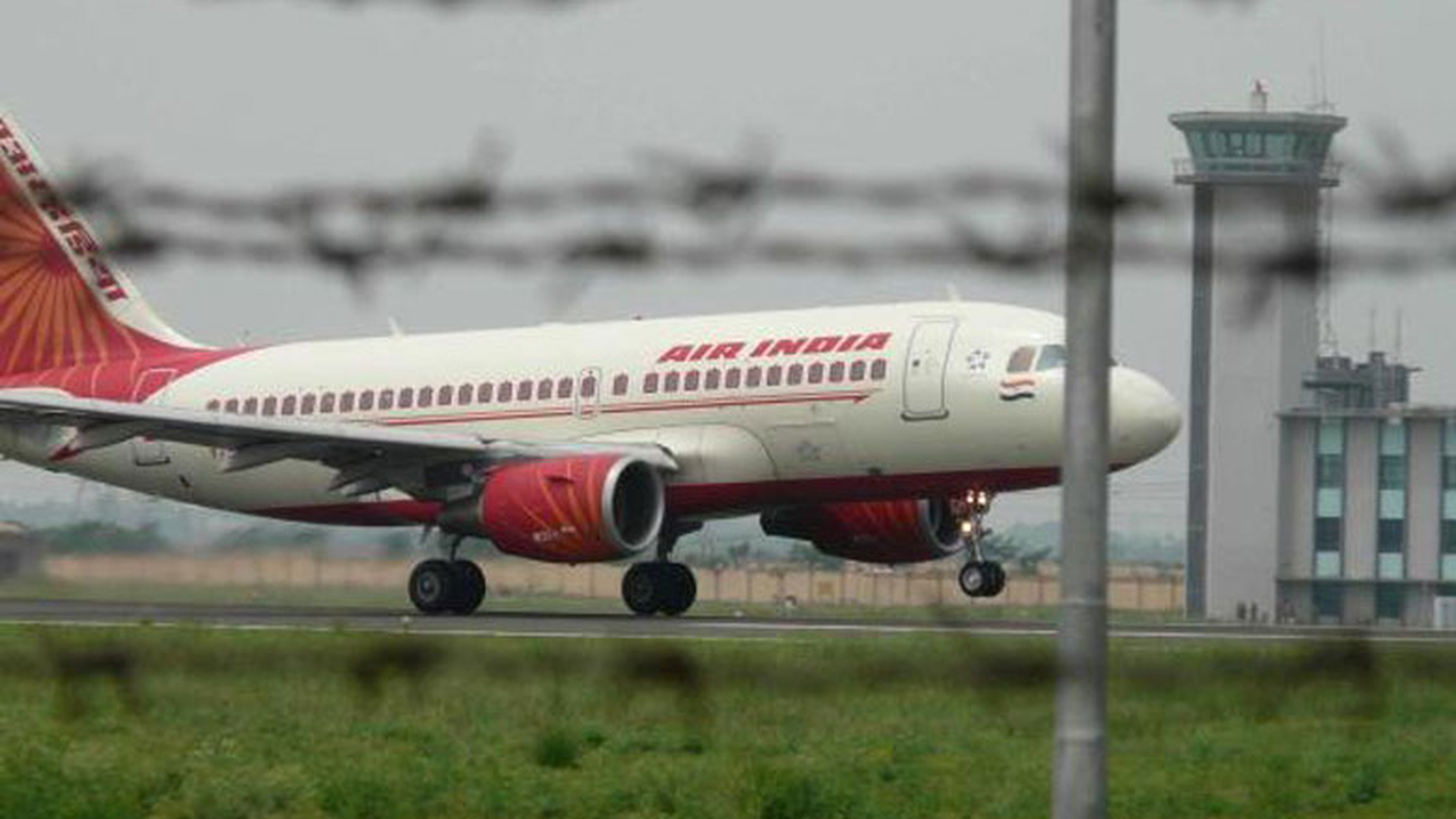 Air India has decided to “roll back” its boarding passes bearing photographs of Prime Minister Narendra Modi and Gujarat Chief Minister Vijay Rupani after they came in for criticism.