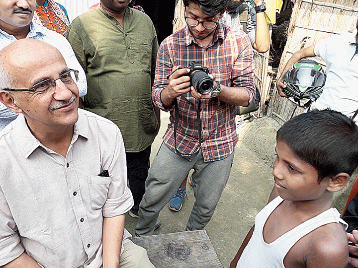Harsh Mander with the children of NRC victims. 