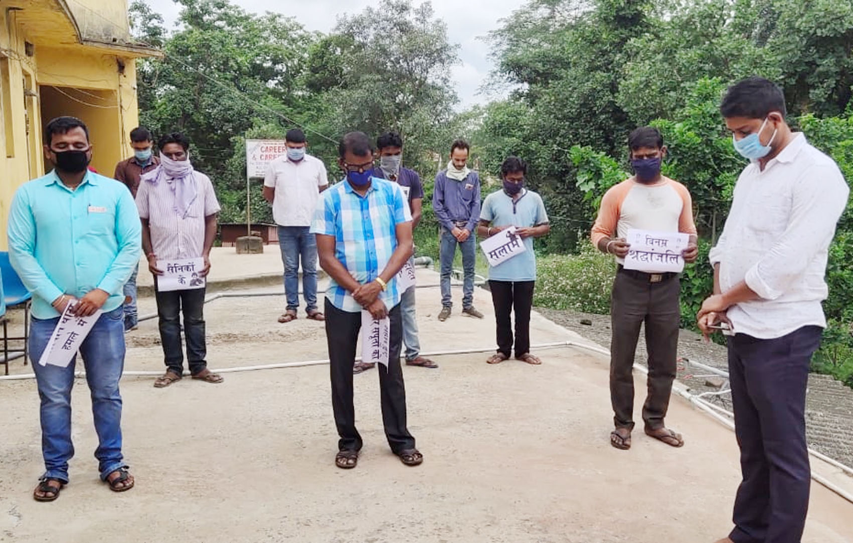 Members of Jan Adhikar Manch pay tributes to martyred soldiers by observing two-minute silence at Sindri in Dhanbad on Wednesday.