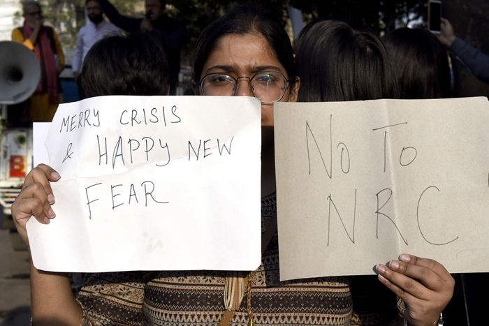 Sharanaya Bhattacharya, who is preparing for medical entrance test, came to the rally at Y-Channel with a poster that said: “Merry Crisis and Happy New Fear”. “What could be scarier? You are seeking to wipe out a community. This is not a Merry Christmas and it does not augur a Happy New Year at all,” she said.