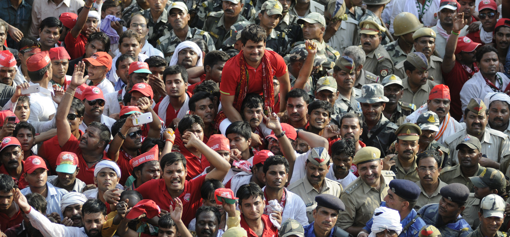 Samajwadi Party supporters at a rally in May 2014 in Varanasi.  A strong showing by the Opposition in a state that the BJP swept in 2014 and again three years later in assembly polls could be a potent symbol of the extent of the BJP’s rejection in its own backyard.