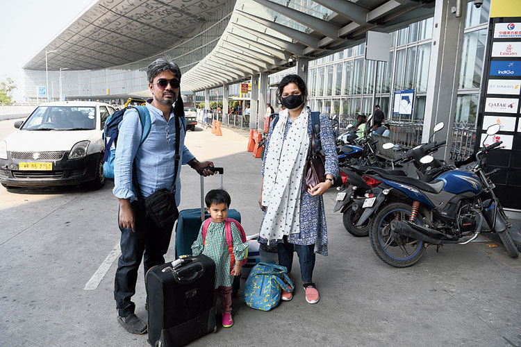 Imranur Rahman with wife Asma Afroz and daughter at the airport on Sunday.