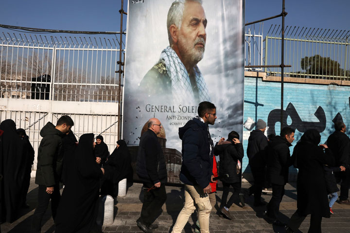 Mourners walk back from a funeral ceremony for Iranian General Qassem Soleimani in Tehran