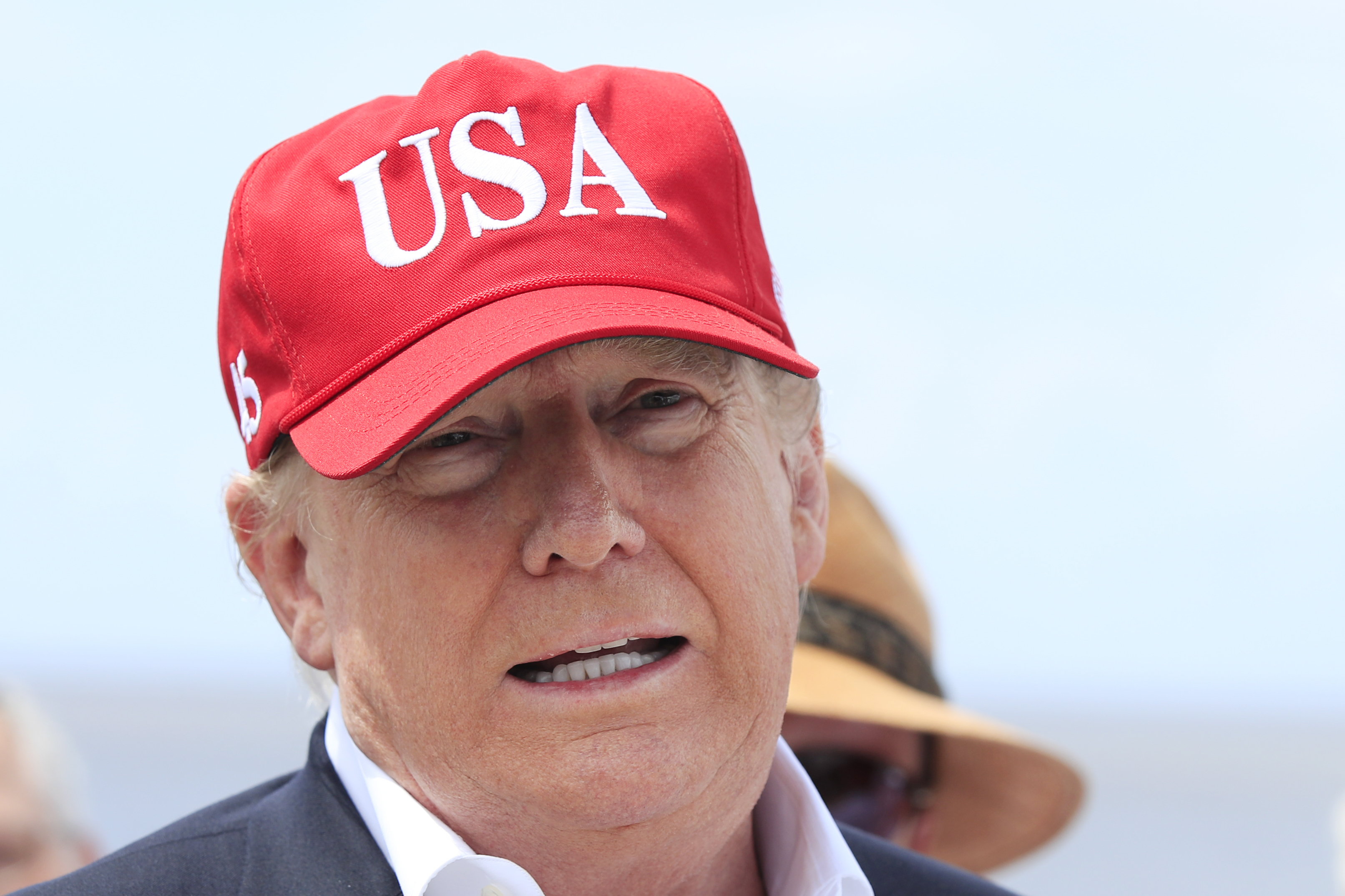 President Donald Trump speaks to reporters during a visit to Lake Okeechobee in Florida on Friday, March 29, 2019. 