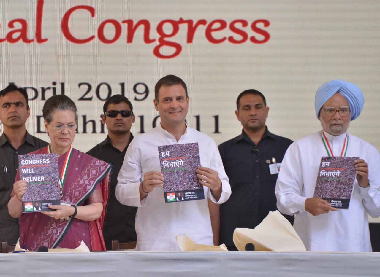 (From left to right) IPA chairperson Sonia Gandhi with Congress president Rahul Gandhi and former Prime Minister Manmohan Singh during the release of the Congress manifesto at the AICC headquarters, in New Delhi, on Tuesday.