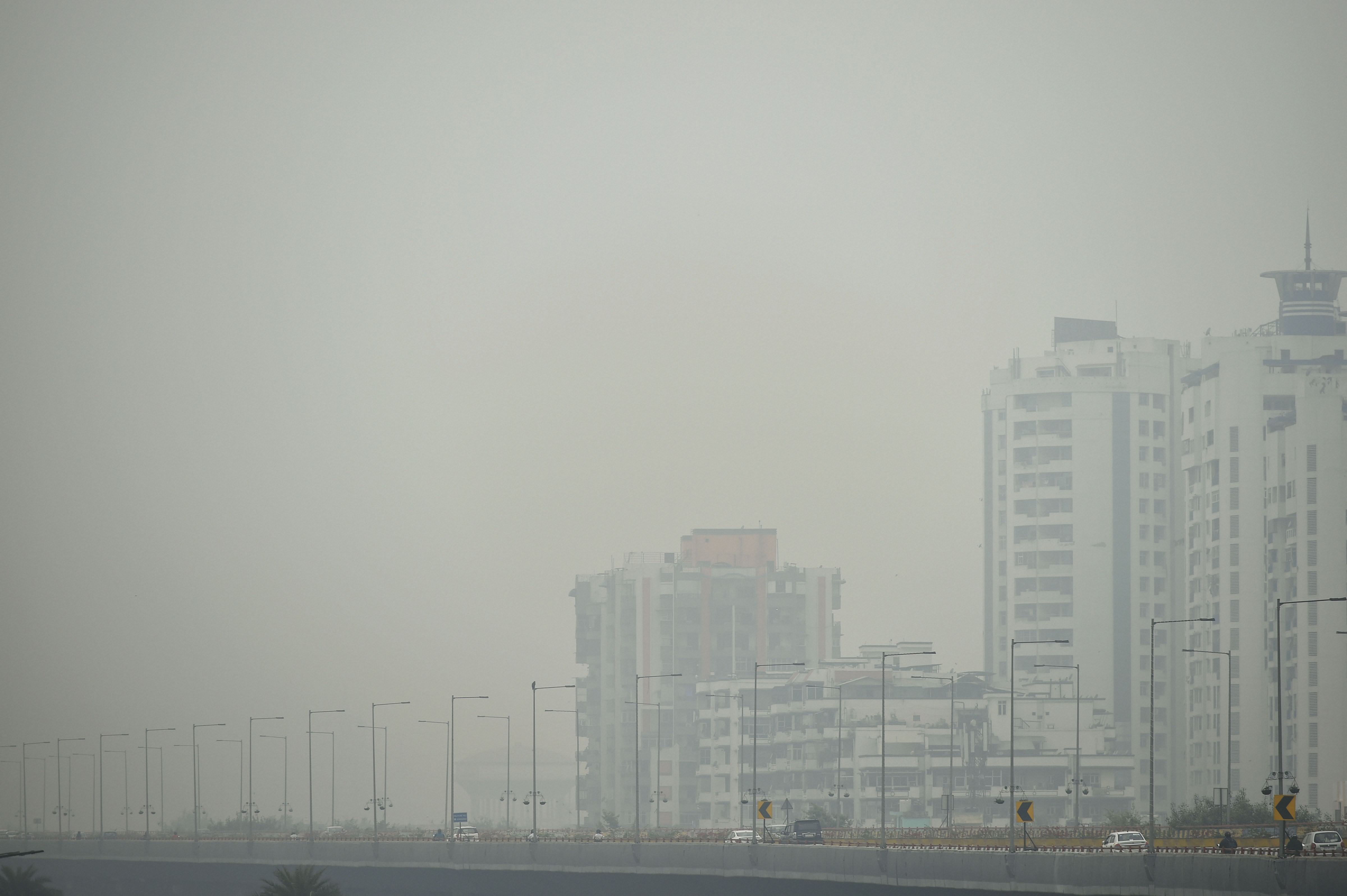  A view of buildings shrouded in heavy haze, in Ghaziabad, Wednesday, October 30, 2019