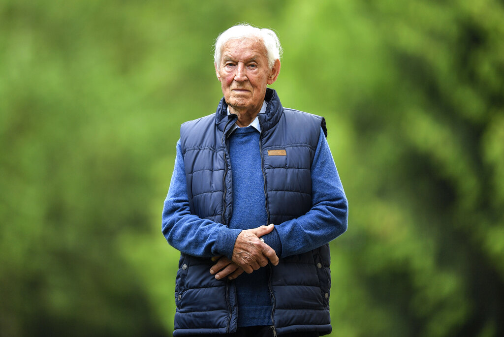 German D-Day veteran Paul Golz poses for a photo at his home in Koenigswinter, Germany, after an interview with The Associated Press on May 17. Golz and his comrades were taken prisoner by an American patrol on June 9, 1944, three days after the Allied landing.