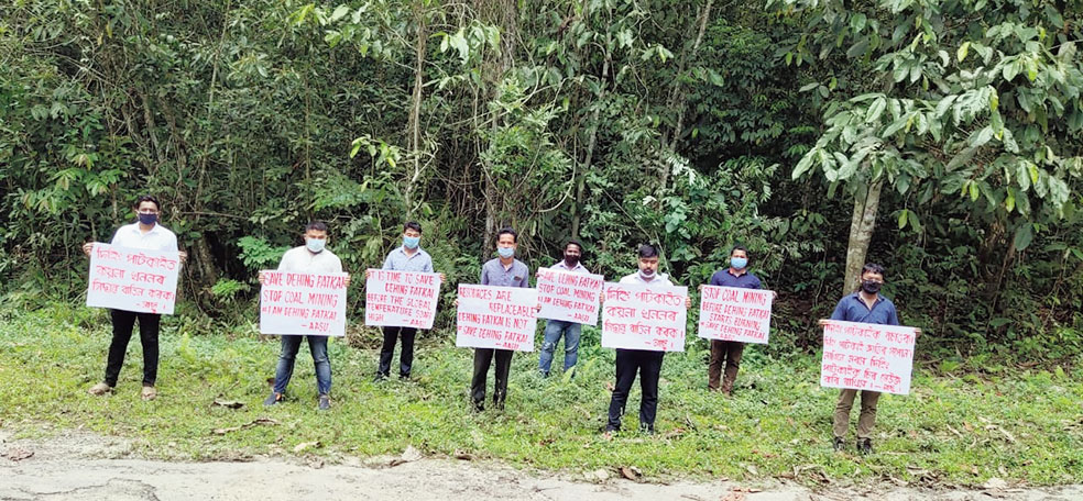 AASU members stage the  protest at Dehing Patkai wildlife sanctuary. 
