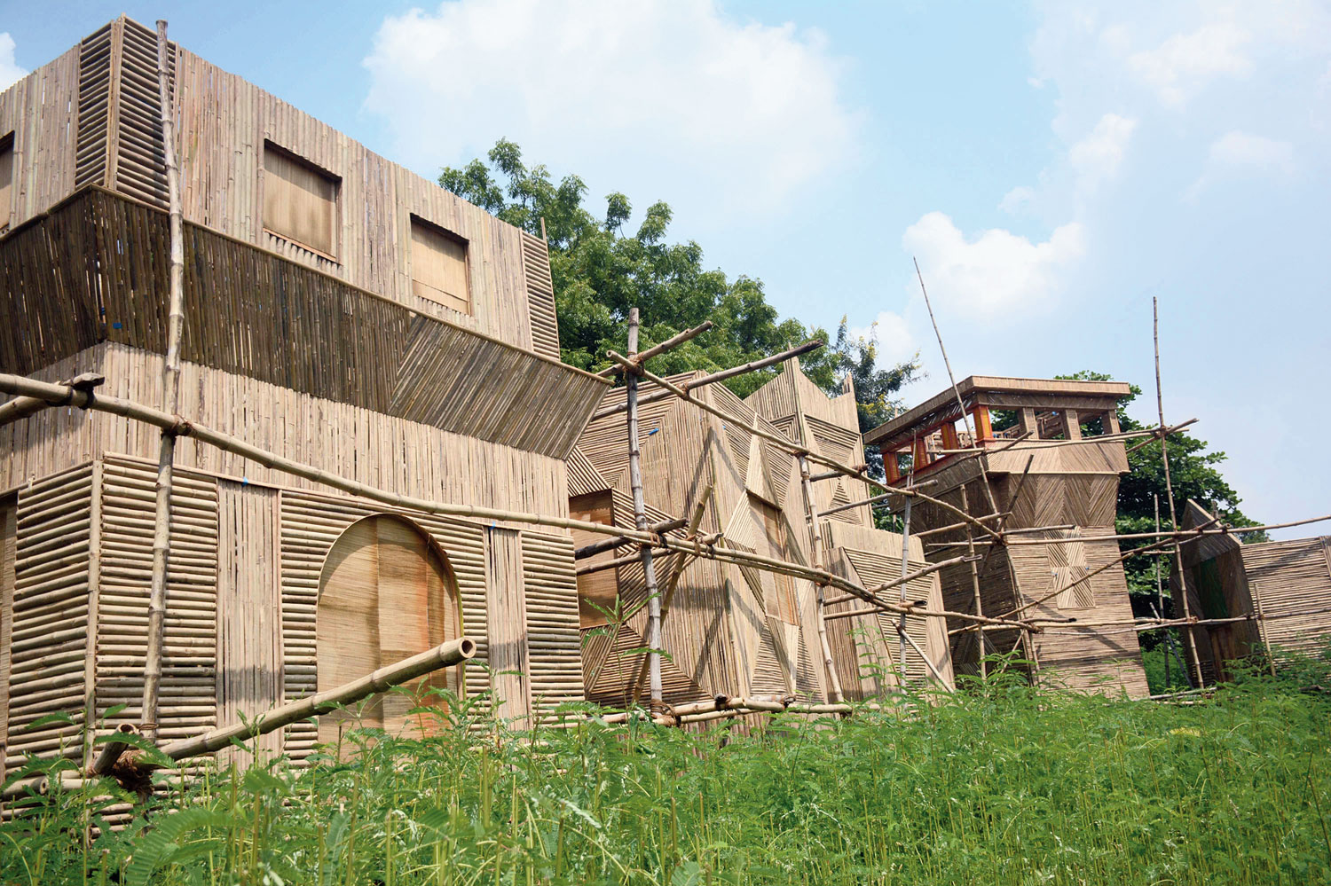 Forest cover: The cane and bamboo pandal hemmed in by a jungle at Jairam Youth Sporting Club in Adityapur inspired by Africa. 