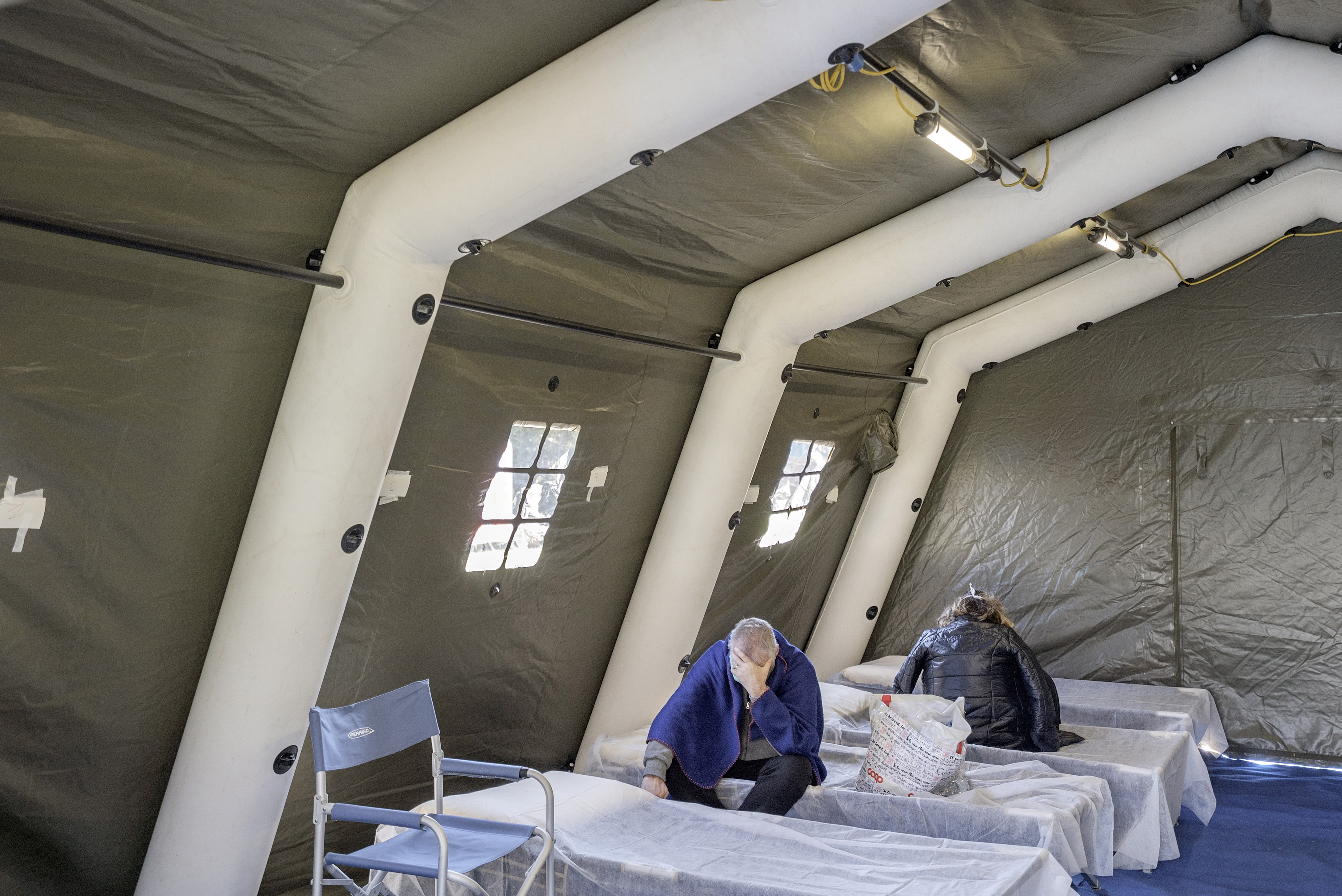 Tents outside a hospital in Brescia, Italy, are setup to provide testing for the coronavirus on Monday, March 16, 2020.