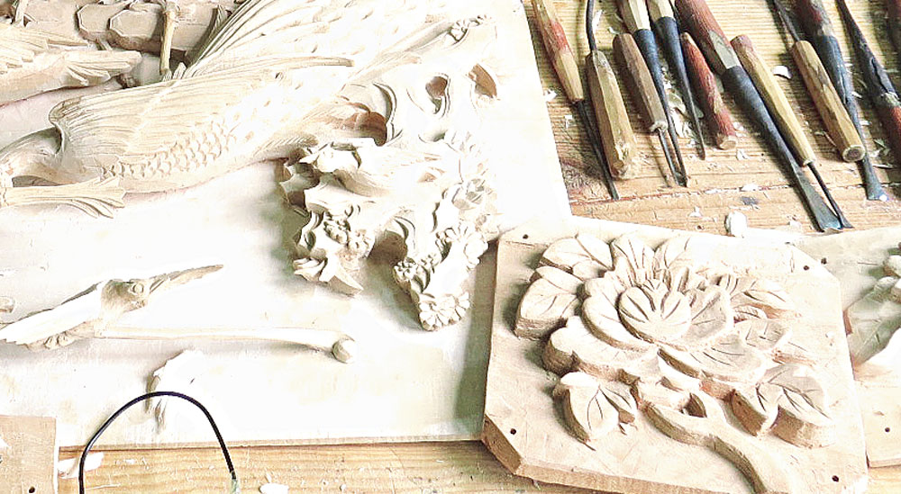 Don’t forget to buy carved wood products if you are in Dali