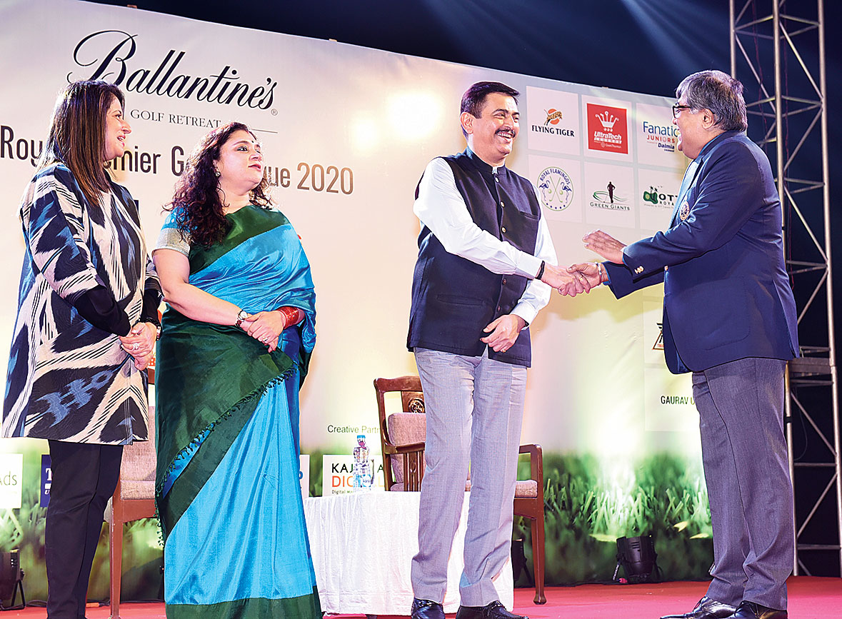 Calcutta police commissioner Anuj Sharma (second from right) and wife Anupama (second from left) were the guests of honour and were greeted by captain Ashish Doshi and Priti Doshi.