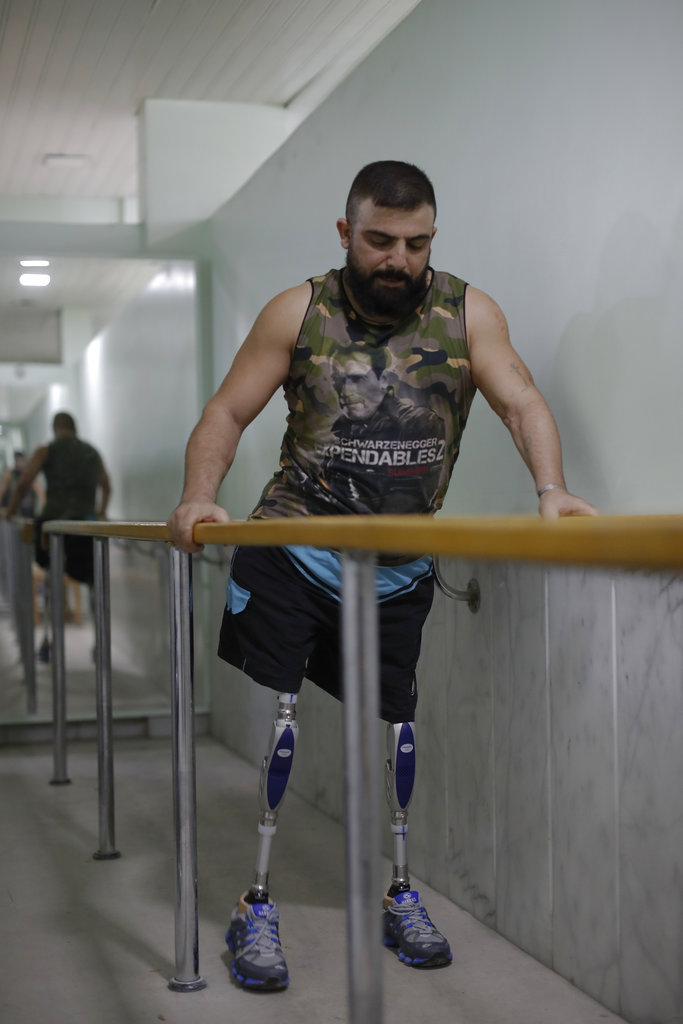 Haidar Hussein lost his legs while fighting on the front lines in Syria's war.