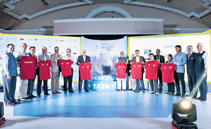 The guests unveil the finisher T-shirt for the Tata Steel Kolkata 25K 2019 at a city hotel on Tuesday