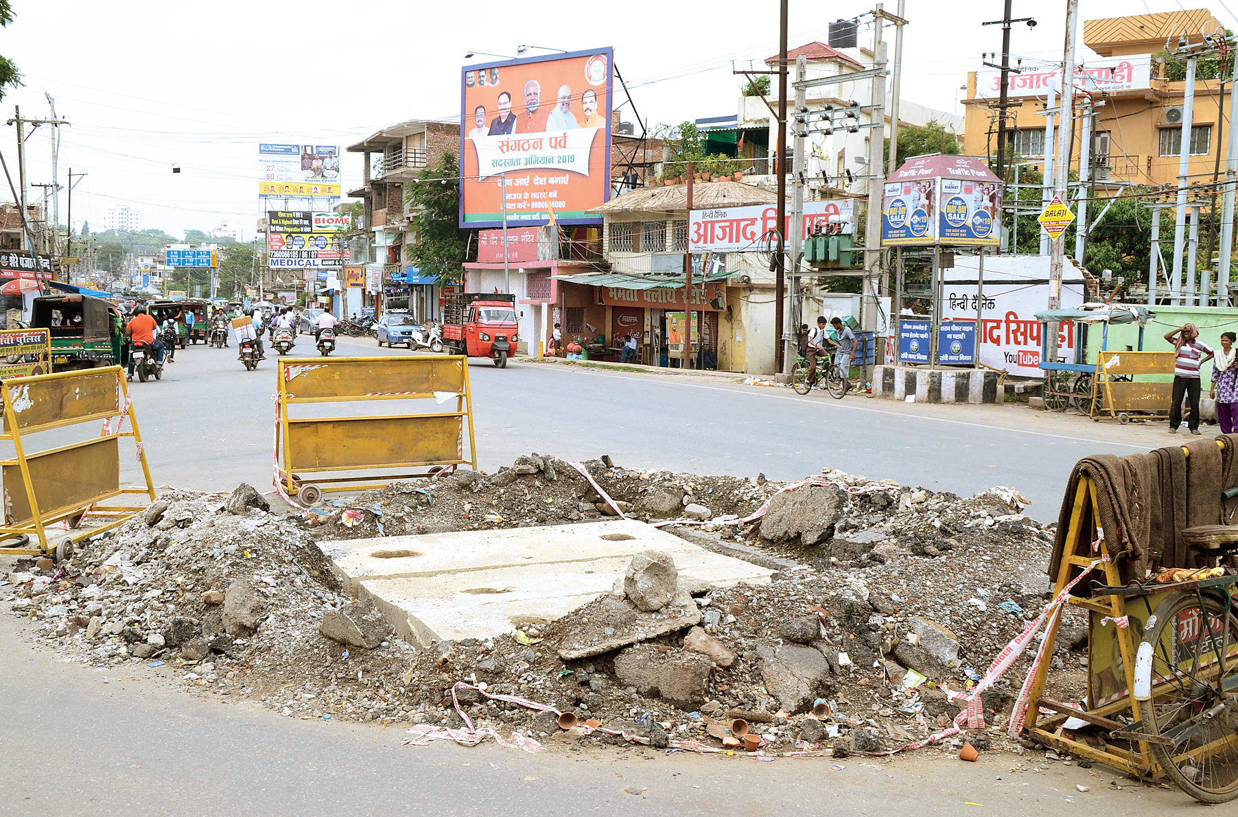 A cement slab is all that covers a dug-up spot at Kokar Chowk in Ranchi on Monday.