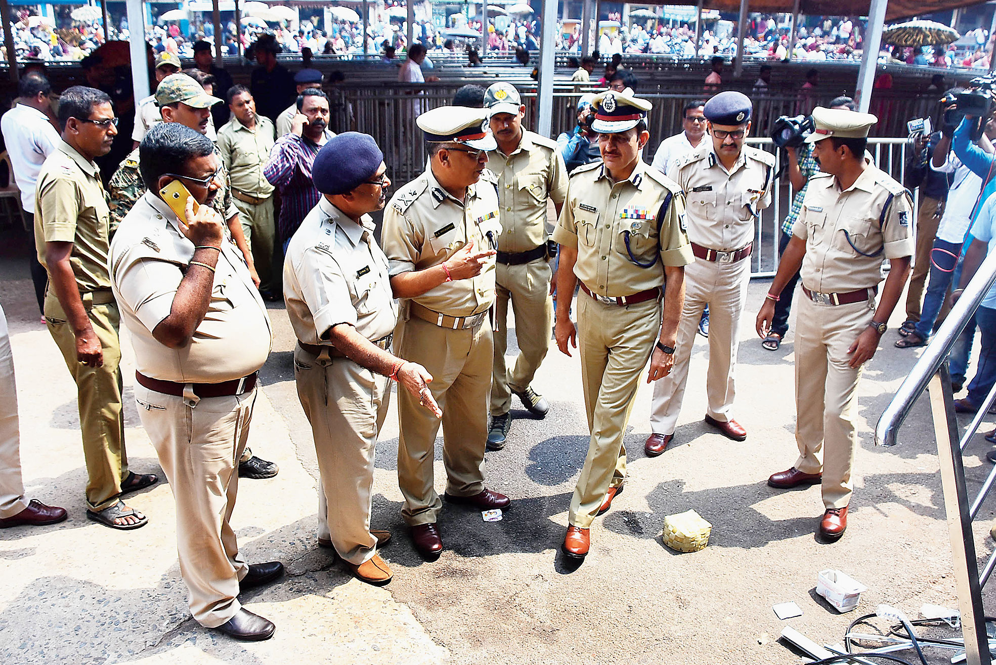 Director general of police RP Sharma with senior police officers at the temple gate on Thursday