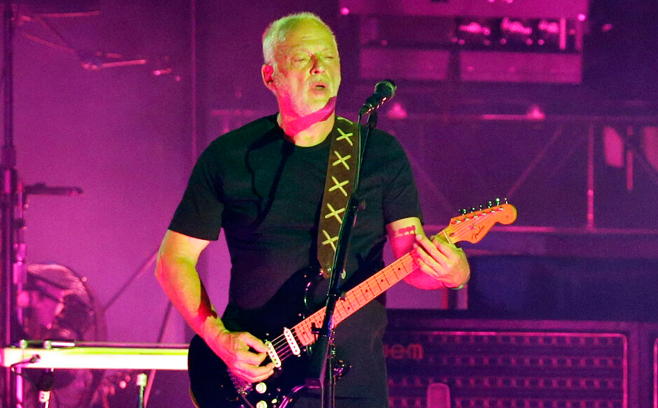 In this July 7, 2016, file photo, musician David Gilmour performs in the ancient roman amphitheater of the Pompeii archeological site, Italy. 