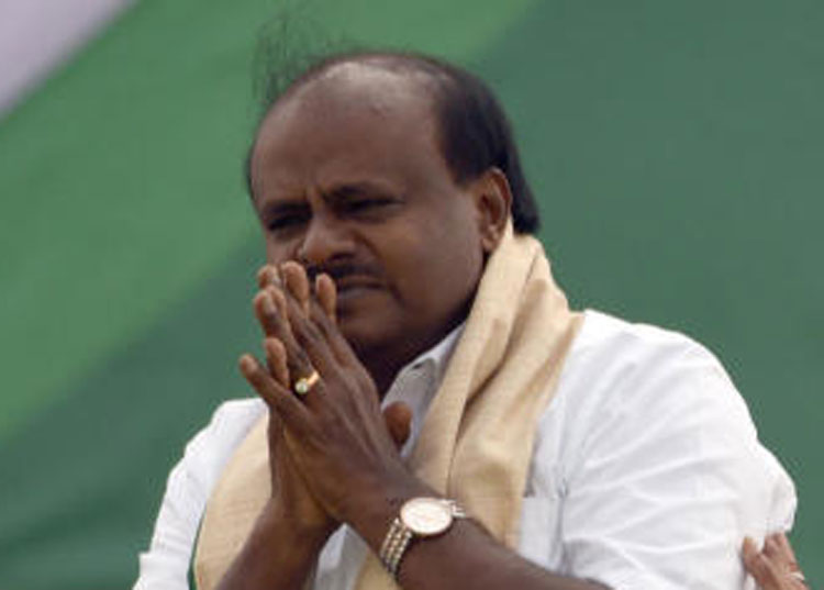 Gowda bid to calm son, save Karnataka alliance