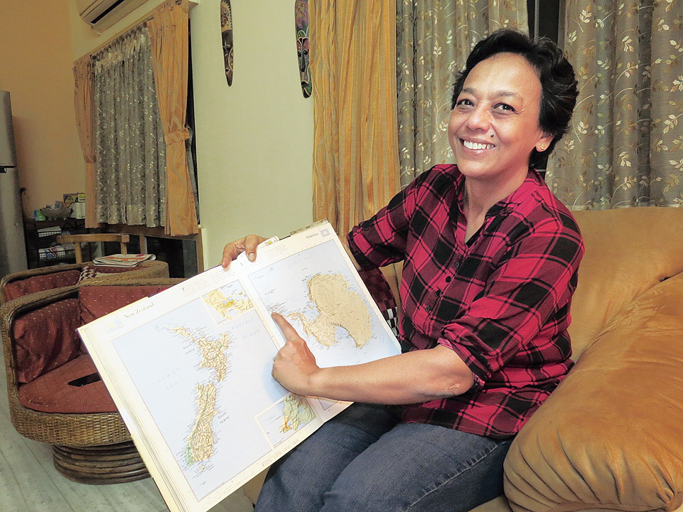 Anuradha Roy points to the tip of the Antarctic peninsula where she hopes to land.