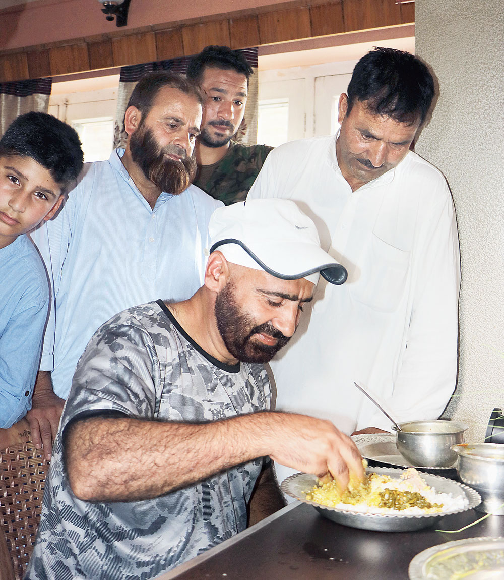 Waja enjoys first lunch at his home in 23 years