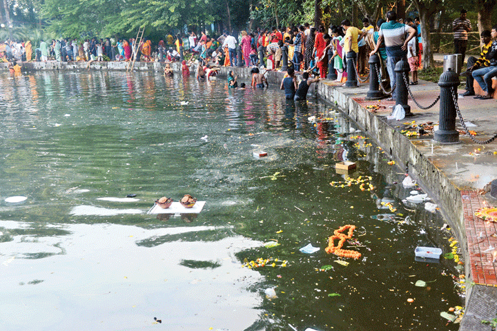 Chhath Puja rituals being performed at Rabindra Sarobar on Sunday.