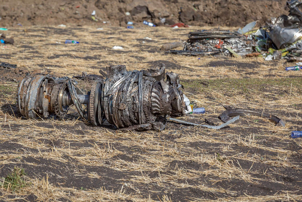 Airplane parts lie on the ground at the scene of an Ethiopian Airlines flight crash south of Addis Ababa.