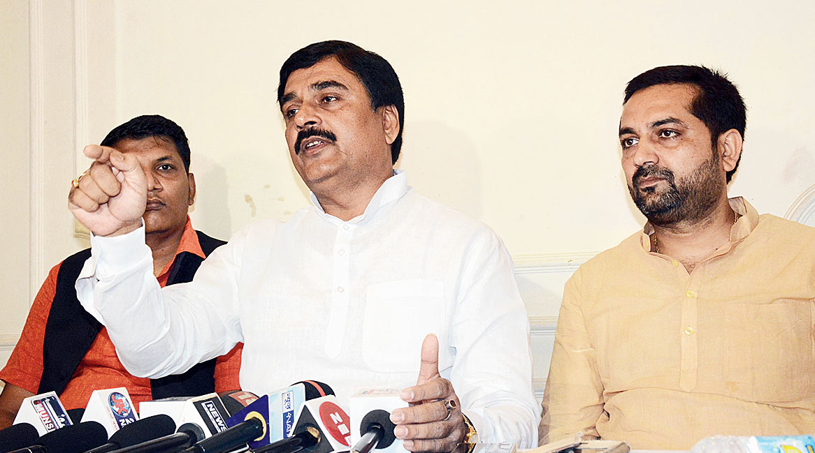 Sudhir Sharma (centre) at the news meet in Patna on Friday.