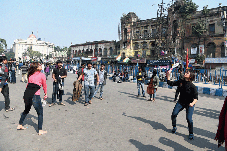 Sreeja Nandy and Ritoja Nandy play badminton at the protest site on Sunday