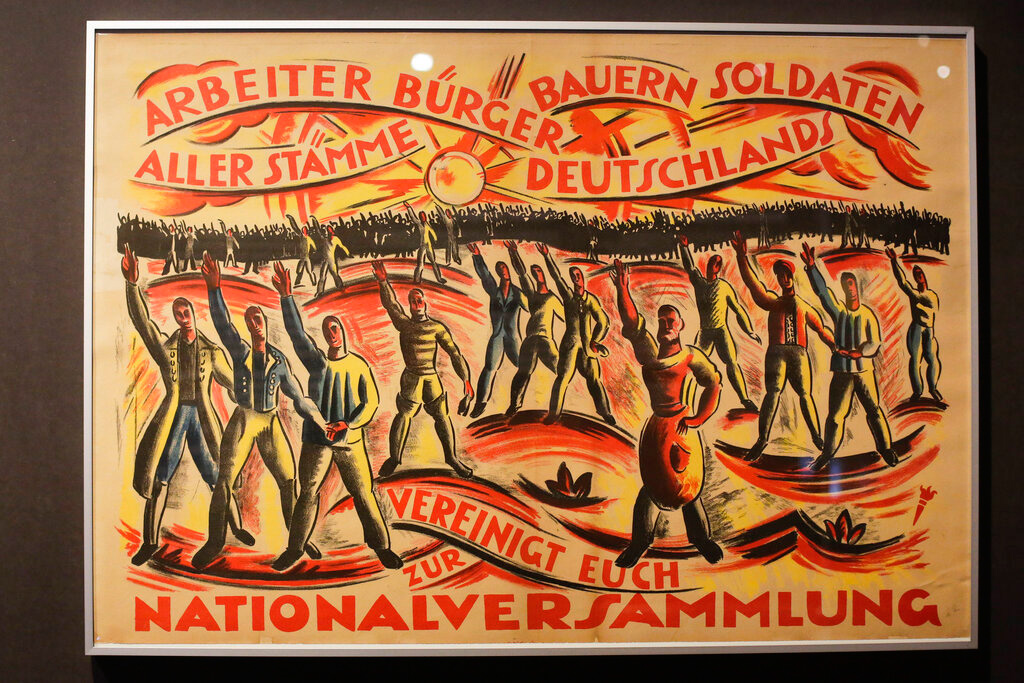 In this Wednesday, April 3, 2019 photo, a historic poster is displayed at the exhibition 'Weimar: The Essence And Value Of Democracy' at the German Historical Museum in Berlin, Germany.
